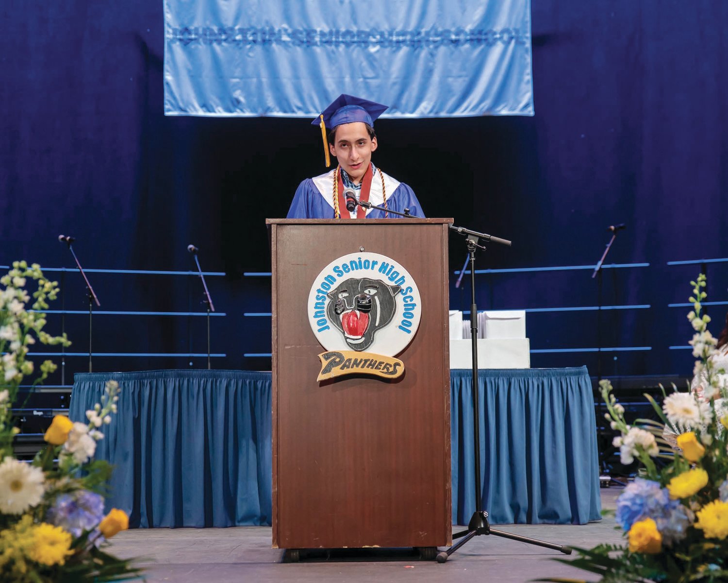 CAPTIVE AUDIENCE: The Johnston Senior High School Class of 2022 listened intently as the Co-Valedictorians — Glorianna Crichlow and Victor M. Fragoso (pictured here) — delivered their commencement addresses. (Photos by Leo van Dijk/rhodyphoto.zenfolio.com)